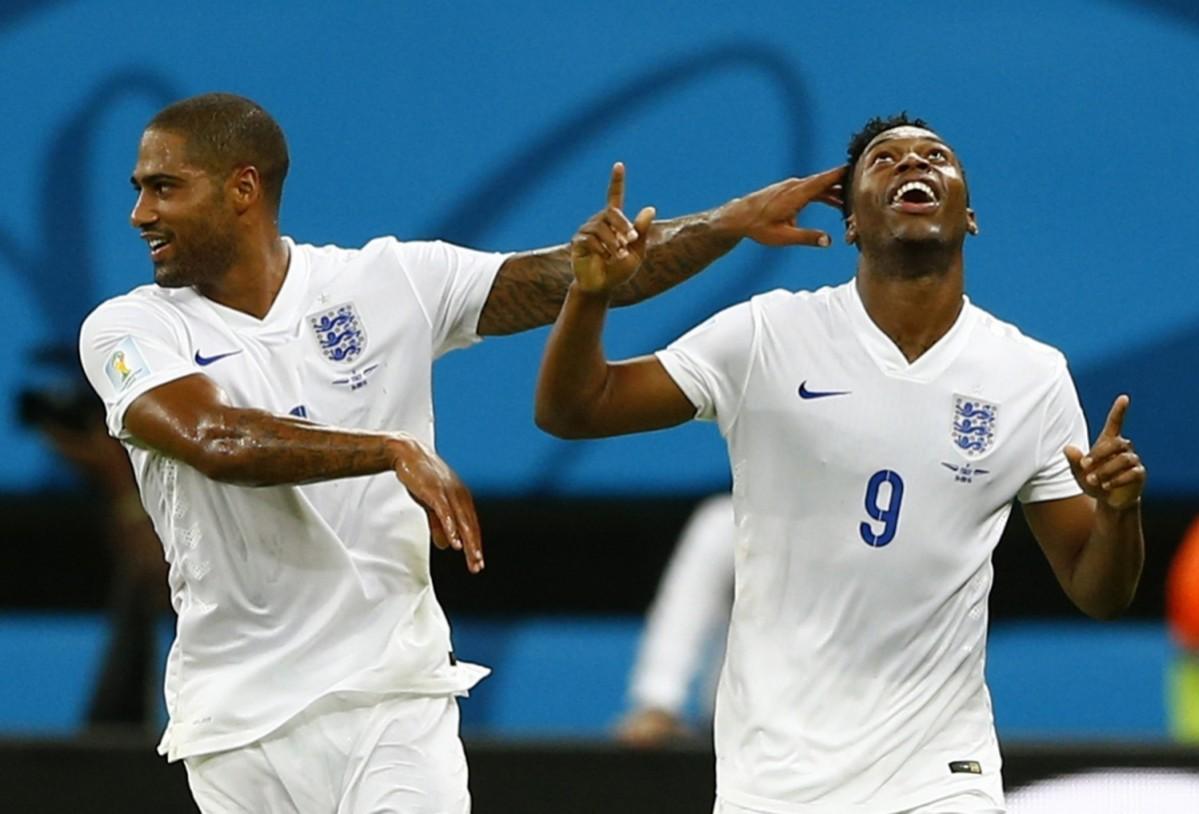 England's Daniel Sturridge celebrates scoring a goal with England's Glen Johnson Italy v England