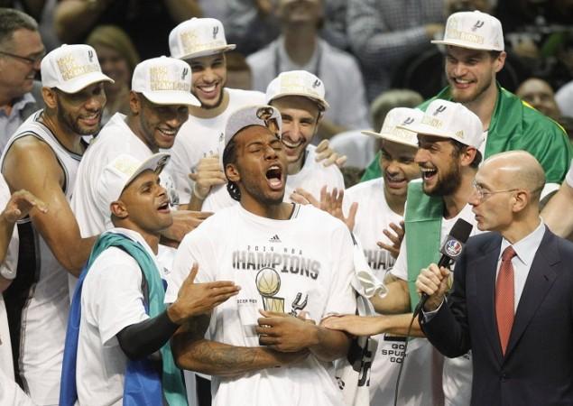 San Antonio Spurs' players congratulate Kawhi Leonard after he was named Finals MVP. Kawhi Leonard MVP