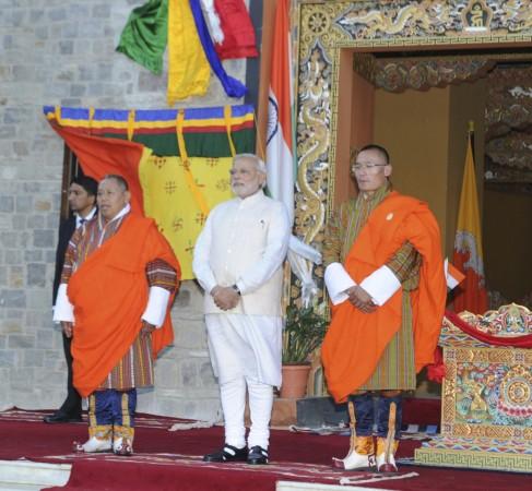 Indian PM Modi and his Bhutanese counterpart Tobgay stand during their bilateral meeting in Thimphu Indian PM Modi and his Bhutanese counterpart Tobgay stand during their bilateral meeting in Thimphu