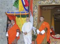 Indian PM Modi and his Bhutanese counterpart Tobgay stand during their bilateral meeting in Thimphu