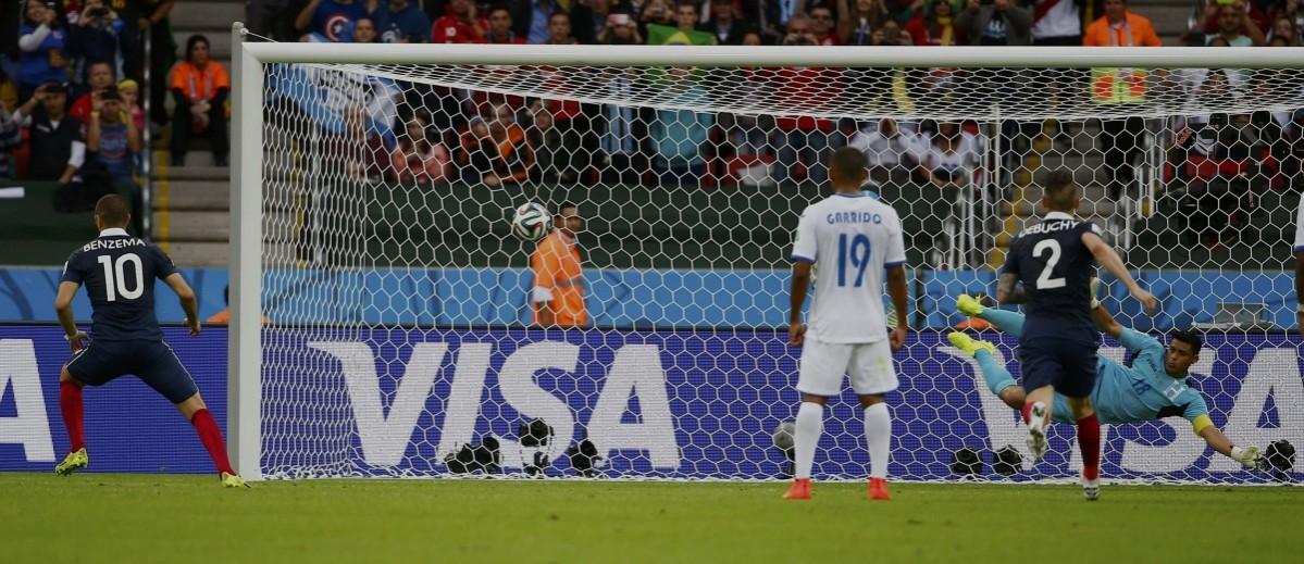 France's Benzema kicks the ball to score a penalty goal during their 2014 World Cup Group E soccer match against Honduras at the Beira Rio stadium in Porto Alegre France v Honduras