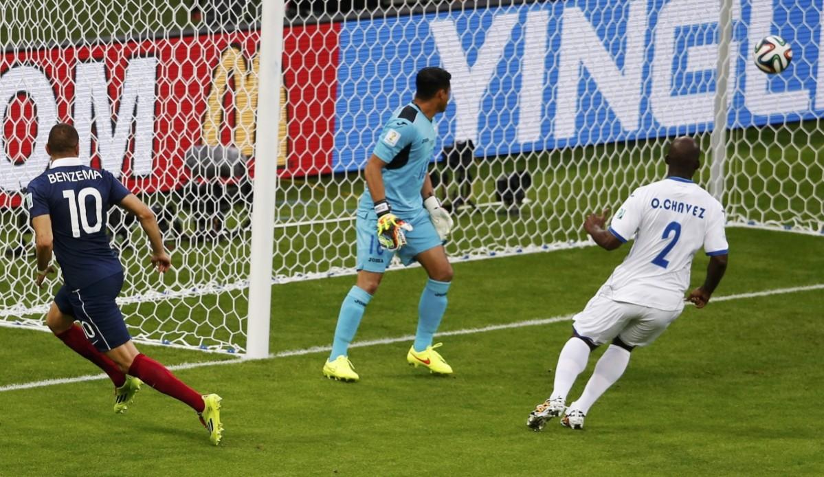 Goalkeeper Valladares of Honduras and teammate Chavez watch as France's Benzema scores a goal during their 2014 World Cup Group E soccer match at the Beira Rio stadium in Porto Alegre France v Honduras