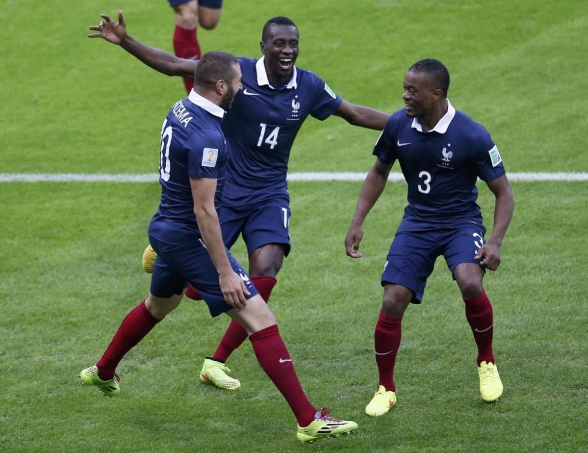 France's Benzema celebrates his team's goal with teammates Matuidi and Evra during their 2014 World Cup Group E soccer match at the Beira Rio stadium in Porto Alegre France v Honduras
