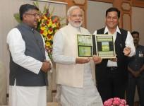 Prime Minister Narendra Modi releases commemorative postage stamps on the 2014 FIFA World Cup, in New Delhi on June 12, 2014.