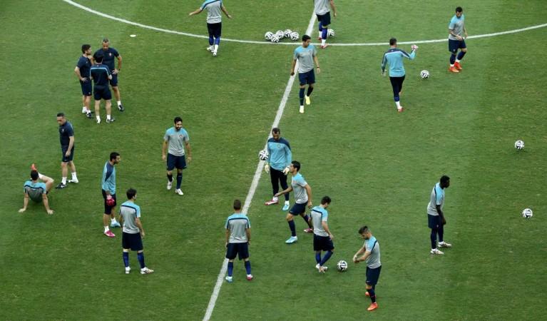 Portugal's team members are pictured during a training session at the Arena Fonte Nova stadium ahead of their 2014 World Cup against Germany in Salvador Portugal