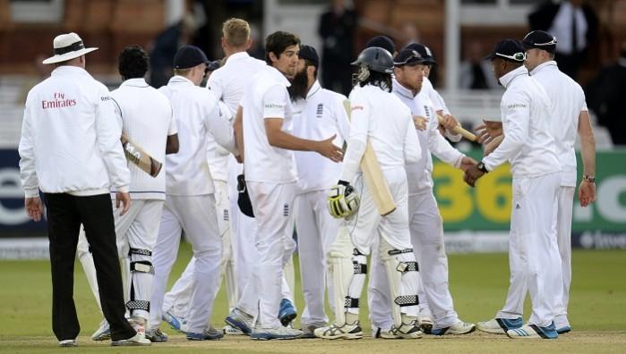 England's captain Alastair Cook shakes hands with Sri Lanka's Nuwan Pradeep. England Cricket Team