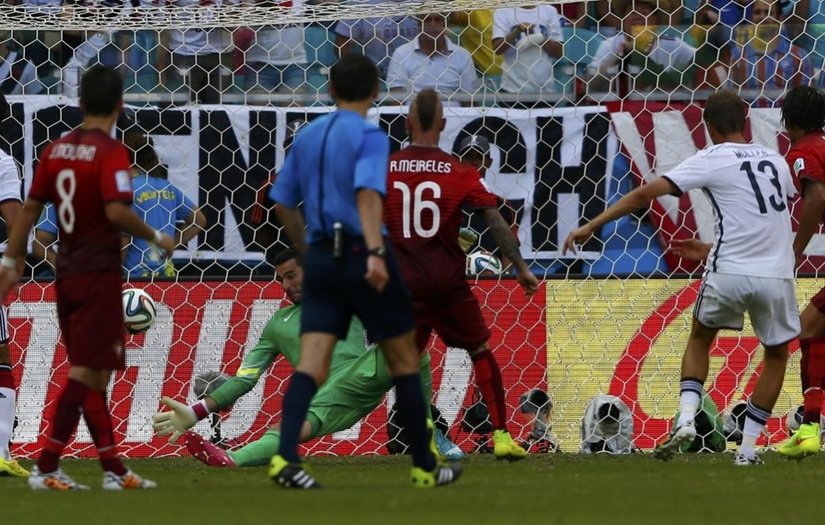 Germany's Thomas Mueller scores their third goal during their 2014 World Cup Group G soccer match against Portugal at the Fonte Nova arena in Salvador Germany v Portugal