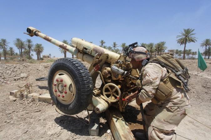 Iraqi security forces fire artillery during clashes with Sunni militant group Islamic State of Iraq and the Levant in in Jurf al-Sakhar Iraqi security forces fire artillery during clashes with Sunni militant group Islamic State of Iraq and the Levant in in Jurf al-Sakhar