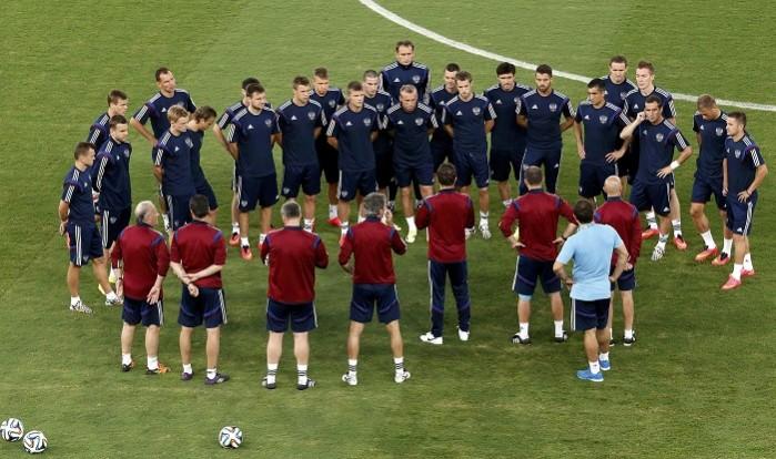 Russia players listen to coach Fabio Capello during a training session, 16 June Russia