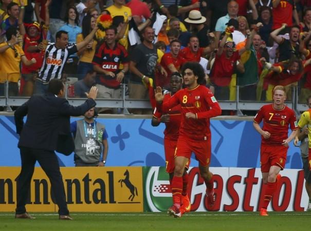 Belgium's Marouane Fellaini celebrates his goal against Algeria. Marouane Fellaini