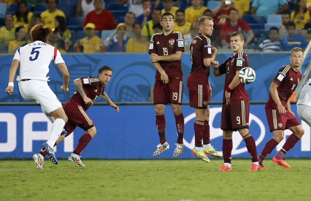South Korea's Kim Young-gwon takes a free kick during their 2014 World Cup Group H soccer match against Russia at the Pantanal arena in Cuiaba Russia v South Korea