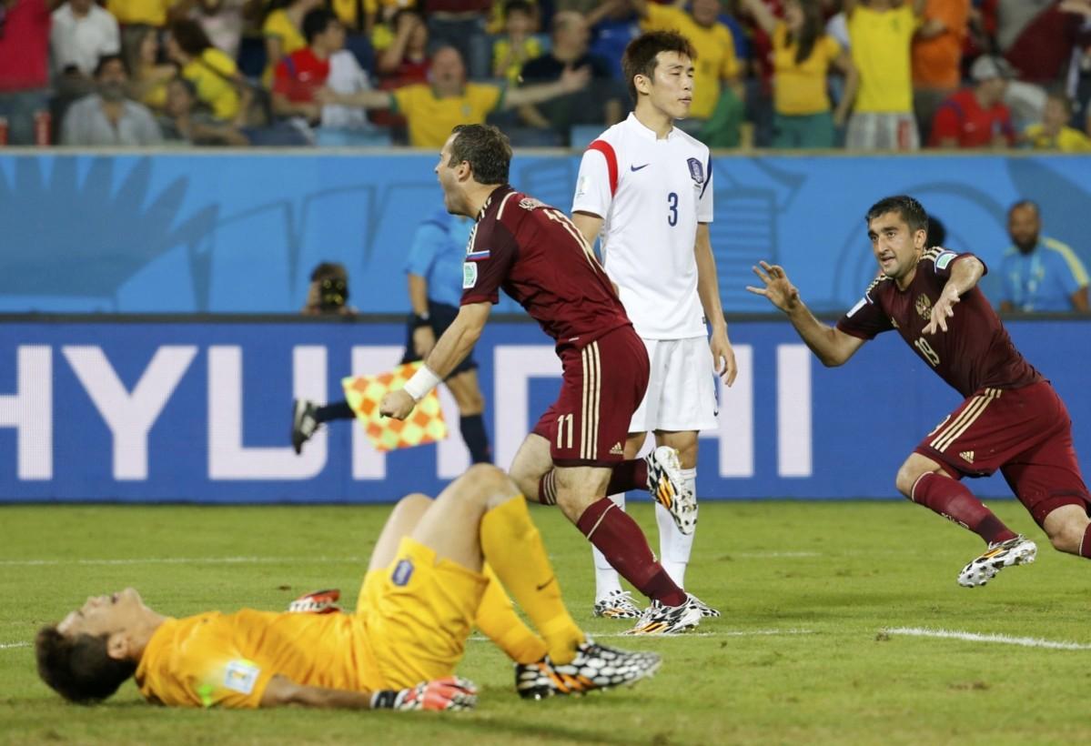 Russia's Alexander Kerzhakov celebrates after scoring a goal against South Korea during their 2014 World Cup Group H soccer match at the Pantanal arena in Cuiaba Russia v South Korea