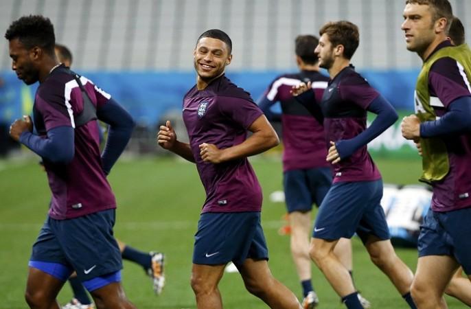 England's Alex Oxlade-Chamberlain trains with teammates. Alex Oxlade-Chamberlain England