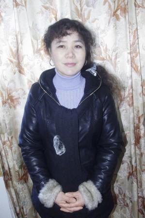 An undated photo shows Chinese activist Liu Ping posing for a photograph in Xinyu An undated photo shows Chinese activist Liu Ping posing for a photograph in Xinyu