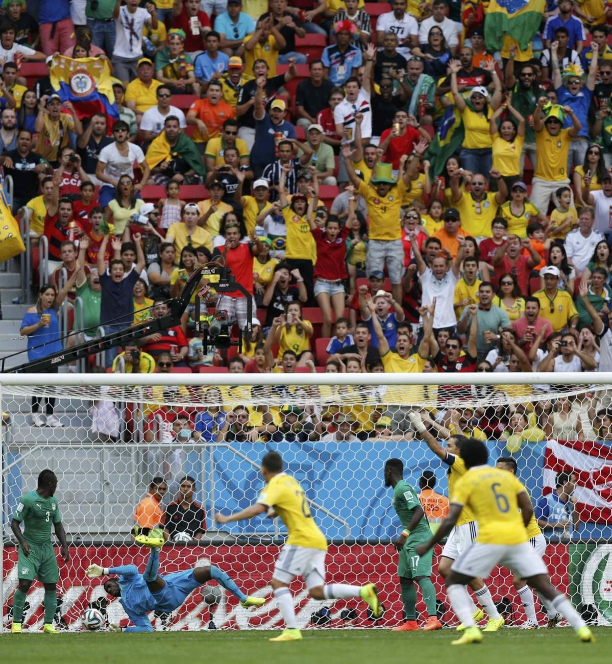 Colombia's Quintero scores his side's second goal against Ivory Coast during their 2014 World Cup Group C soccer match at the Brasilia national stadium in Brasilia Colombia vs Ivory Coast