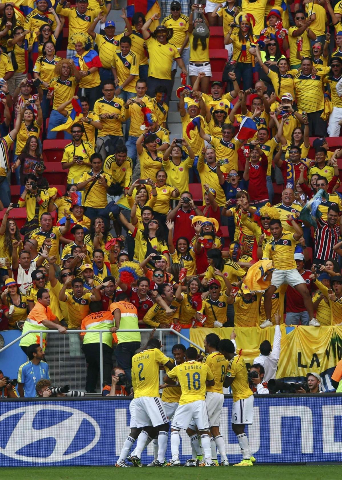 Colombia celebrate Juan Quintero's goal during the 2014 World Cup Group C soccer match between Colombia and Ivory Coast at the Brasilia national stadium Colombia vs Ivory Coast