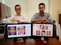 Enrique Ortiz and Afshin Dehfghan demonstrate the computer tool that matched images of Catherine Zeta Jones with her children (University of Central Florida)
