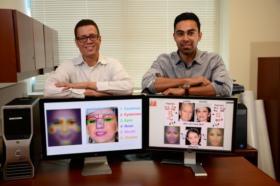 Enrique Ortiz and Afshin Dehfghan demonstrate the computer tool that matched images of Catherine Zeta Jones with her children (University of Central Florida)