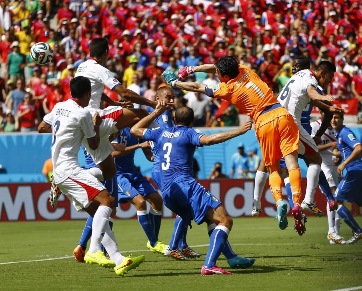 Italy's goalkeeper Buffon makes a save against Costa Rica during their 2014 World Cup Group D soccer match at the Pernambuco arena in Recife Italy vs Costa Rica