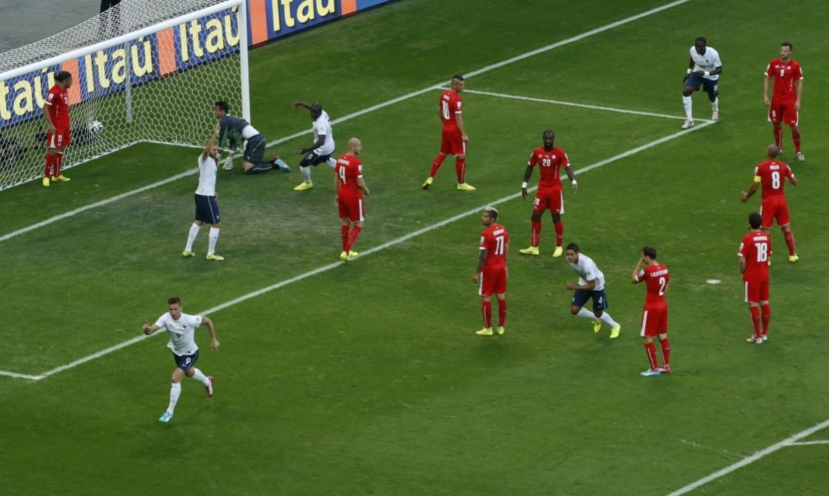 France's Olivier Giroud scores a goal during their 2014 World Cup Group E soccer match against Switzerland at the Fonte Nova arena in Salvador Switzerland vs France
