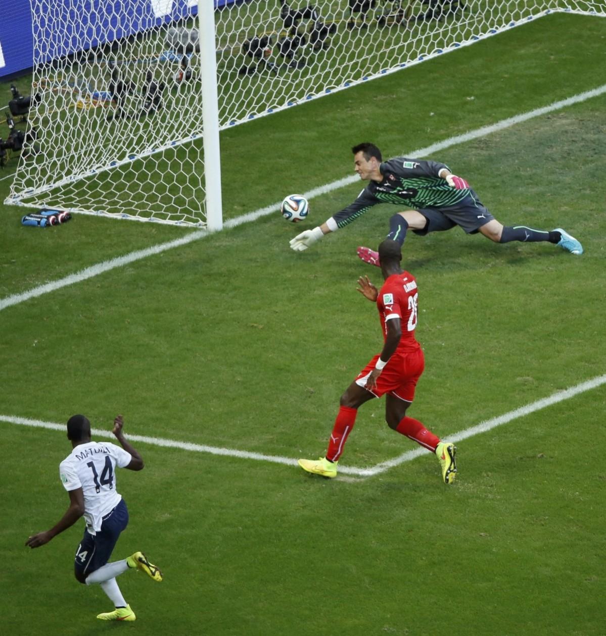 France's Blaise Matuidi scores France's second goal during the 2014 World Cup Group E soccer match between Switzerland and France at the Fonte Nova arena Switzerland vs France