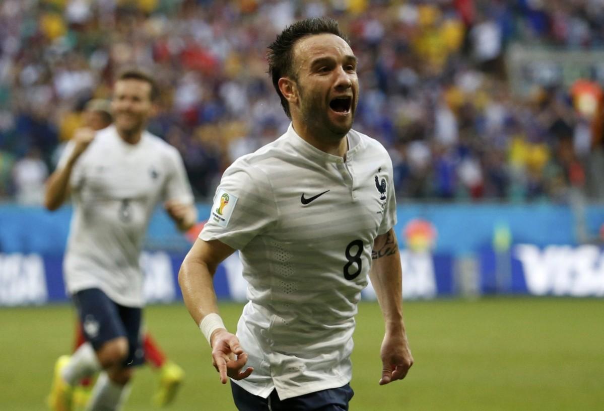 France's Mathieu Valbuena celebrates after scoring France's third goal during their 2014 World Cup Group E soccer match against Switzerland at the Fonte Nova arena in Salvador Switzerland vs France