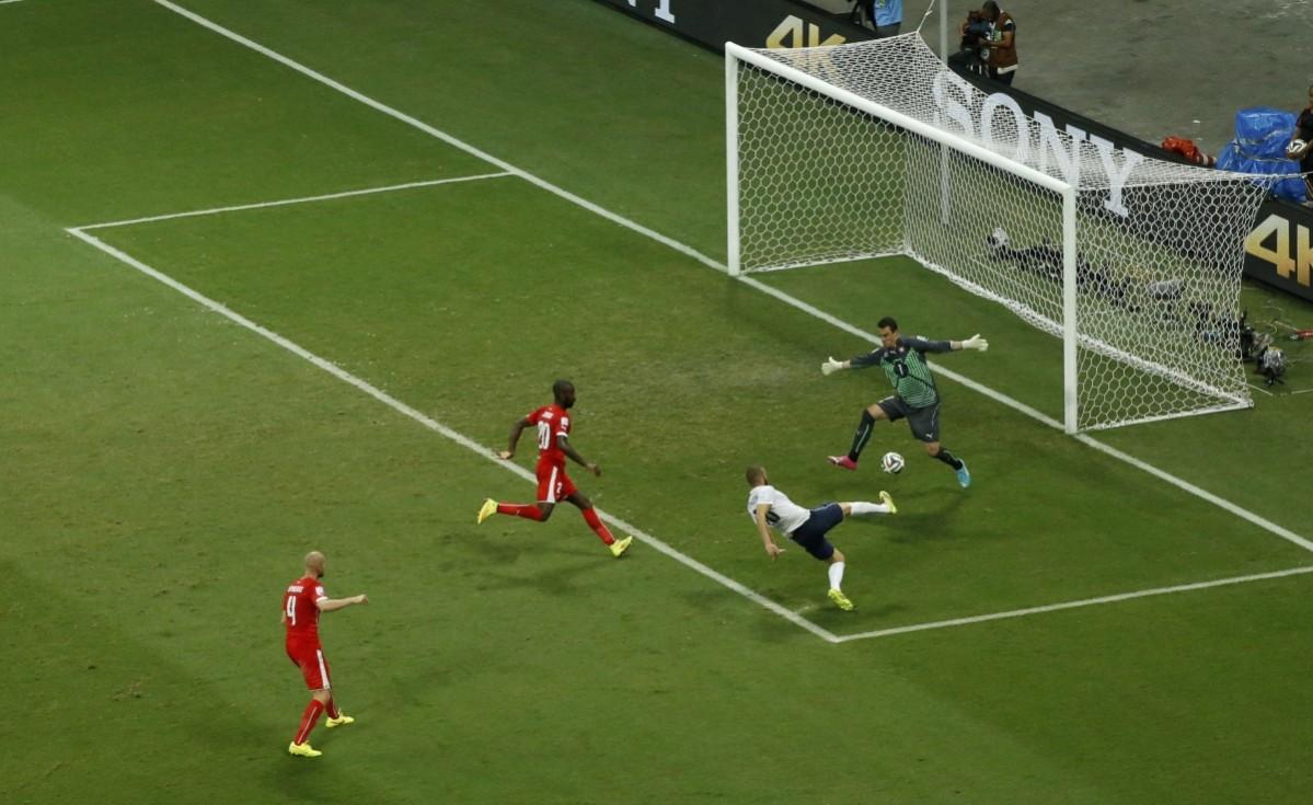 France's Karim Benzema celebrates after scoring their fourth goal during their 2014 World Cup Group E soccer match against Switzerland at the Fonte Nova arena in Salvador Switzerland vs France