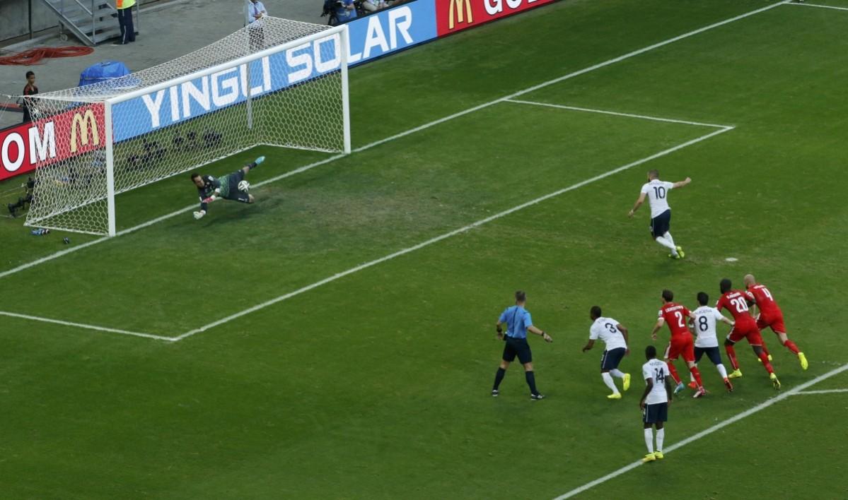 Switzerland's goalkeeper Diego Benaglio saves a penalty shot by France's Karim Benzema during their 2014 World Cup Group E soccer match at the Fonte Nova arena Switzerland vs France