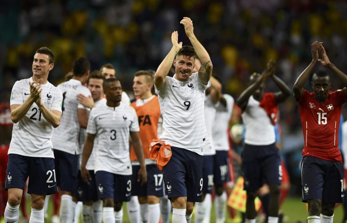 France's Giroud celebrates with his teammates after their victory over Switzerland during their 2014 World Cup Group E soccer match at the Fonte Nova arena in Salvador Switzerland vs France