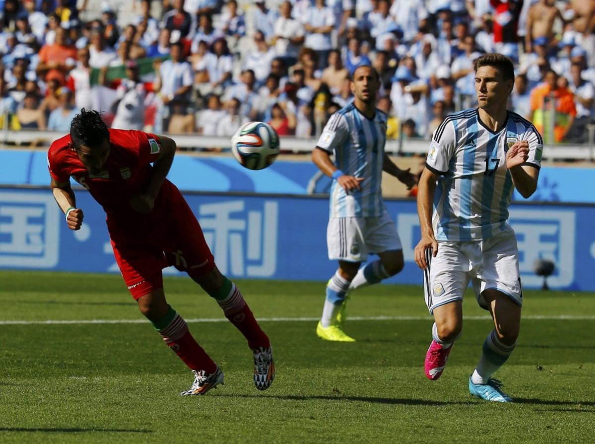 Iran's Ghoochannejhad attempts to score a header during their 2014 World Cup Group F match against Argentina at the Mineirao stadium in Belo Horizonte Argentina vs Iran