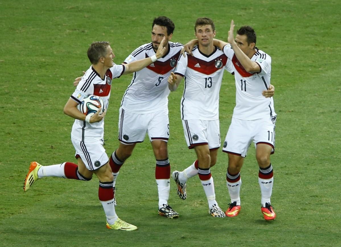 Germany's Klose celebrates his goal with teammates Schweinsteiger ,Hummels and Mueller during their 2014 World Cup Group G match against Ghana at the Castelao arena in Fortaleza Germany v Ghana