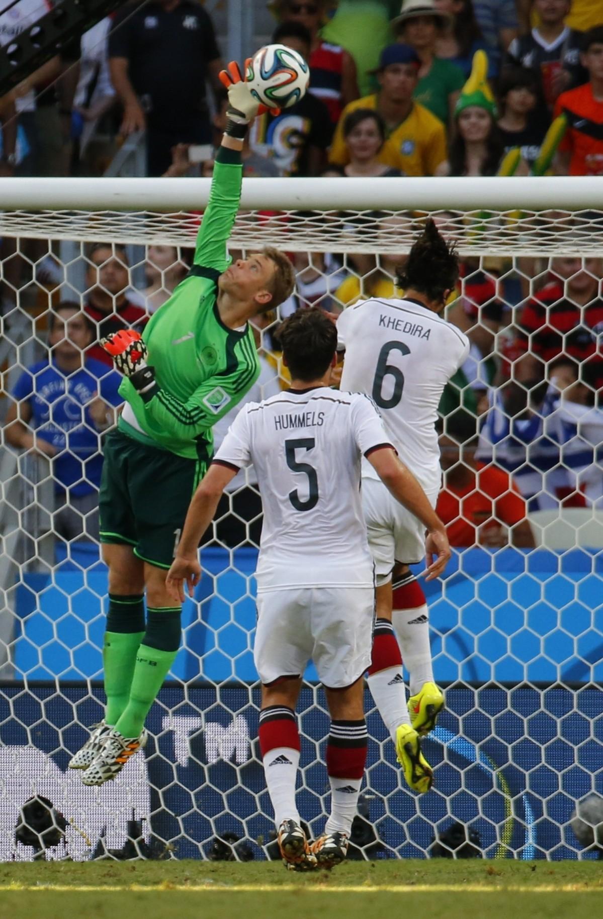 Germany's goalkeeper Neuer makes a save against Ghana during their 2014 World Cup Group G match at the Castelao arena in Fortaleza Germany v Ghana