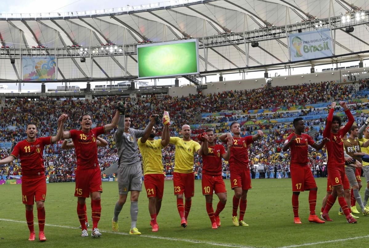 Belgium's players celebrate after winning their during their 2014 World Cup Group H match against Russia at the Maracana stadium in Rio de Janeiro Belgium vs Russia