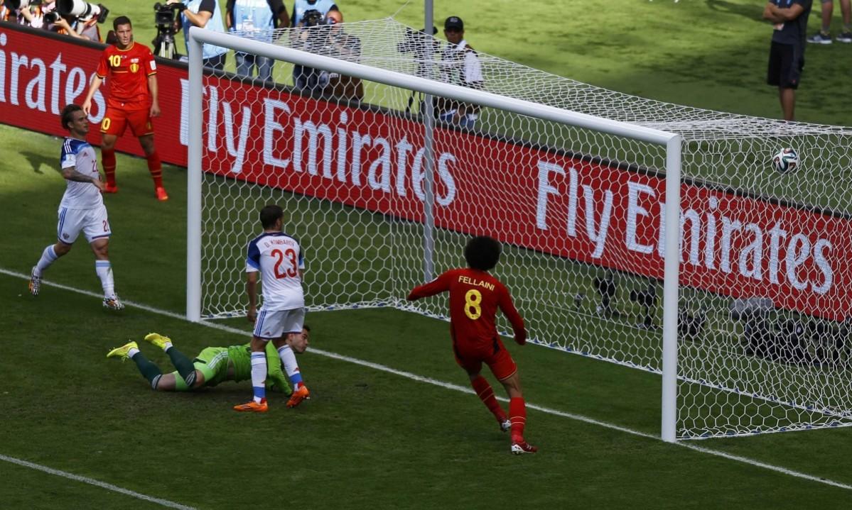Belgium's Divock Origi scores past Russia's goalkeeper Igor Akinfeev during their 2014 World Cup Group H match at the Maracana stadium Belgium vs Russia
