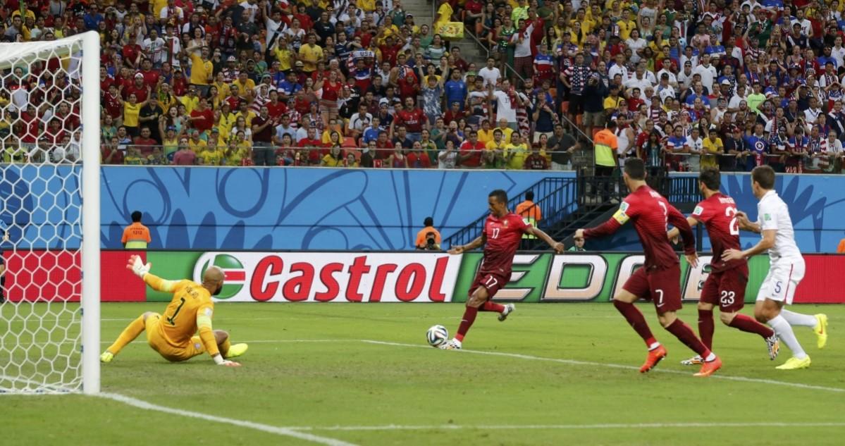 Portugal's Cristiano Ronaldo watches Portugal's Nani score a goal during the 2014 World Cup G match between Portugal and the U.S. at the Amazonia arena USA vs Portugal