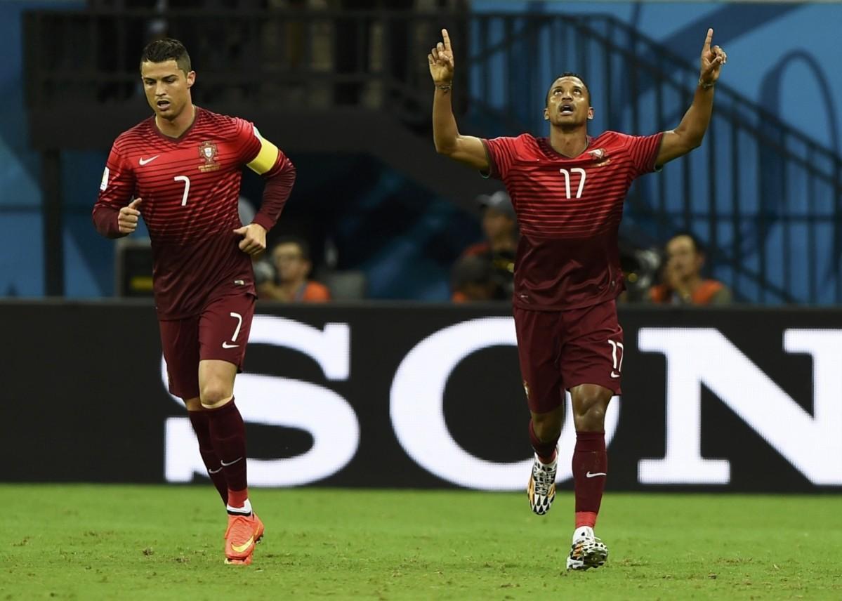 Portugal's Nani celebrates next to his teammate Ronaldo after scoring a goal against U.S. during their 2014 World Cup Group G match at the Amazonia arena in Manaus USA vs Portugal