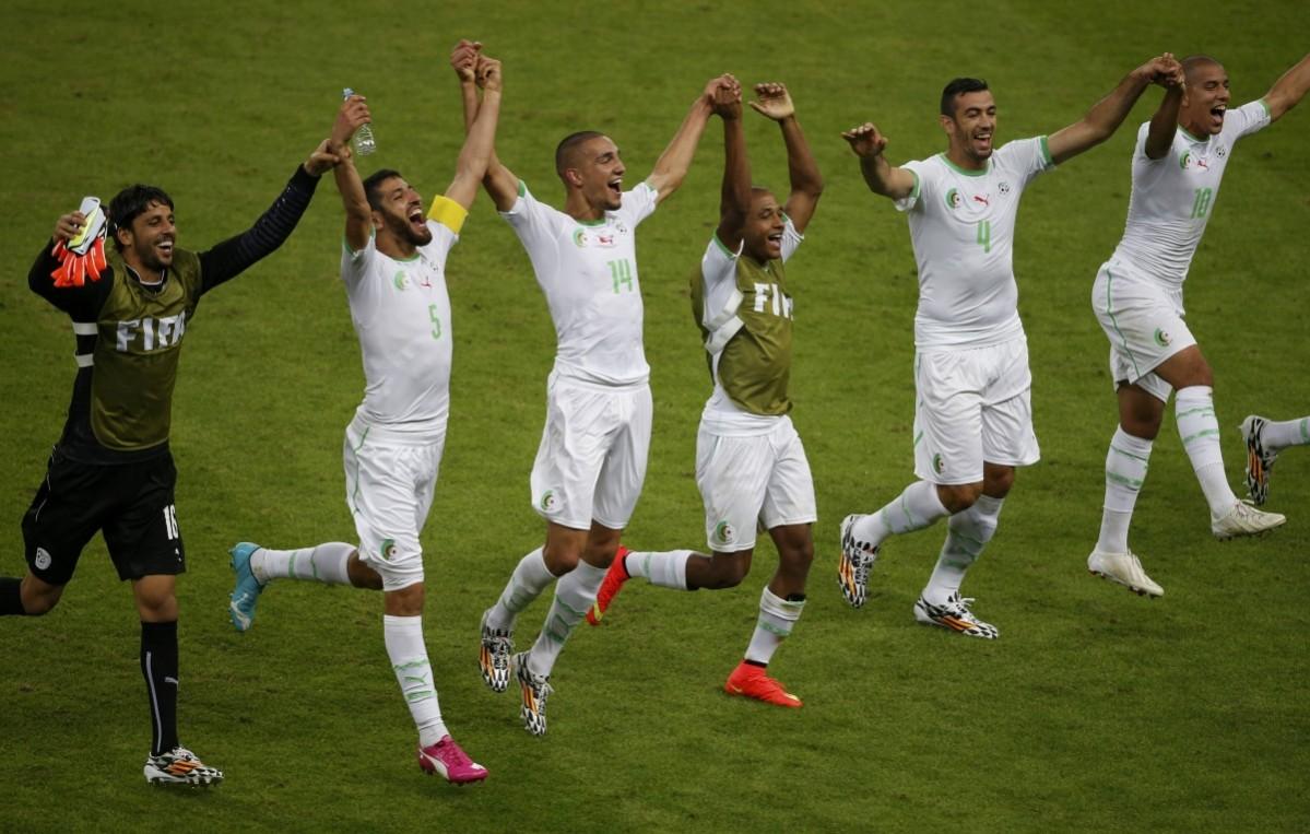 Algeria's national soccer players celebrate their win over South Korea after their 2014 World Cup H soccer match at the Beira Rio stadium in Porto Alegre South Korea v Algeria