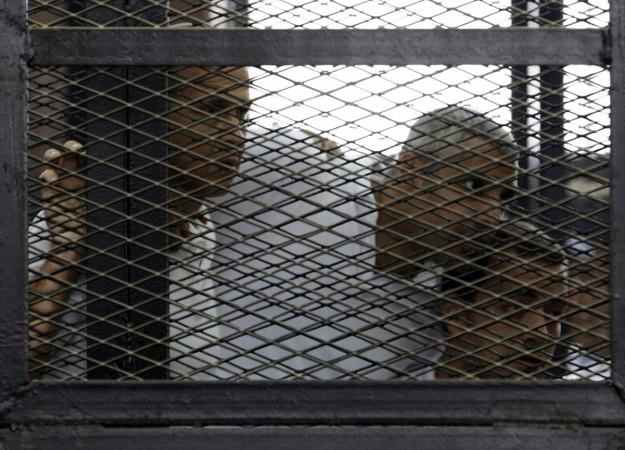 Peter Greste, Mohamed Fahmy and Baher Mohamed of Al-Jazeera English, listen to the ruling at a court in Cairo Peter Greste, Mohamed Fahmy and Baher Mohamed listen to the ruling at a court in Cairo