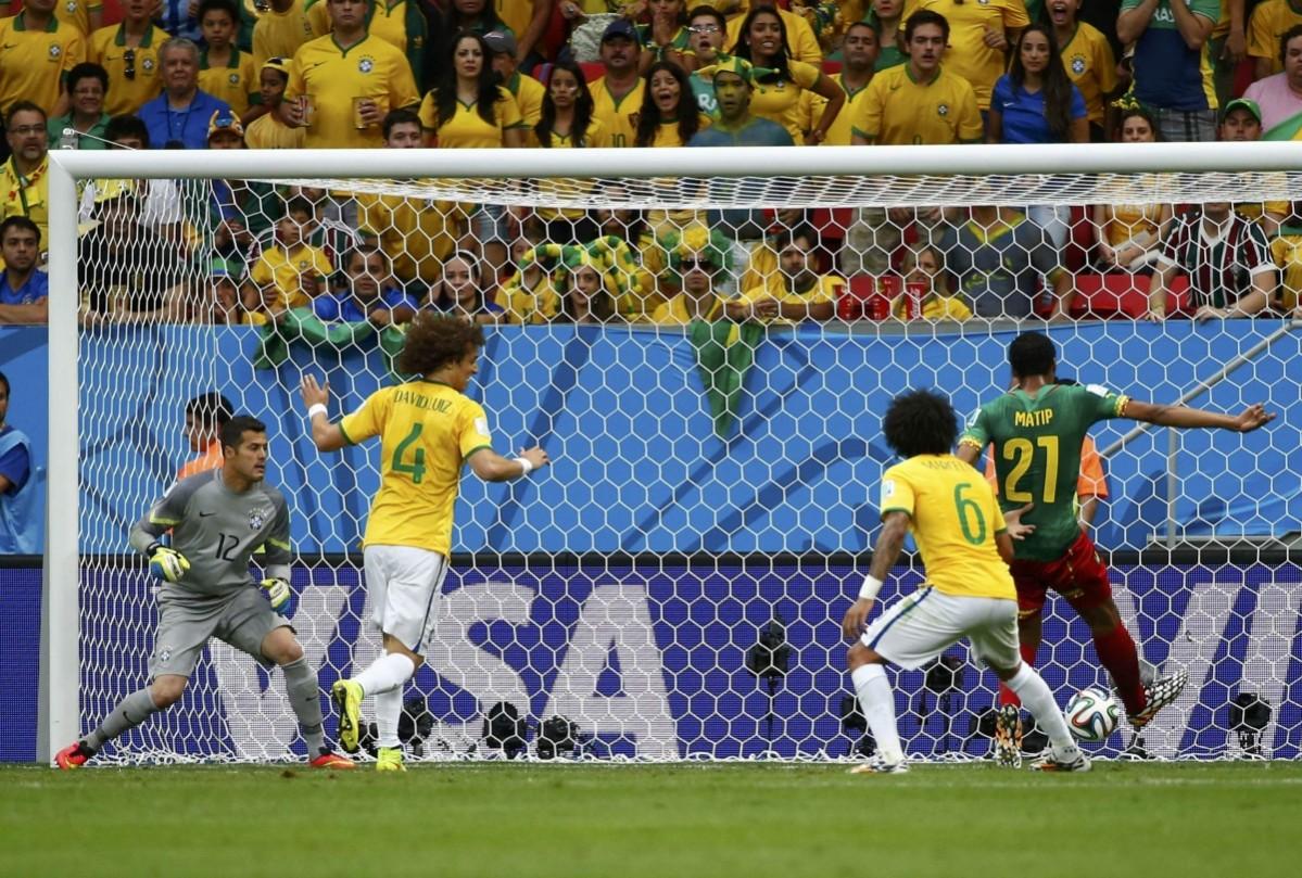 Cameroon's Matip shoots to score against Brazil during their 2014 World Cup Group A match at the Brasilia national stadium in Brasilia Cameroon v Brazil