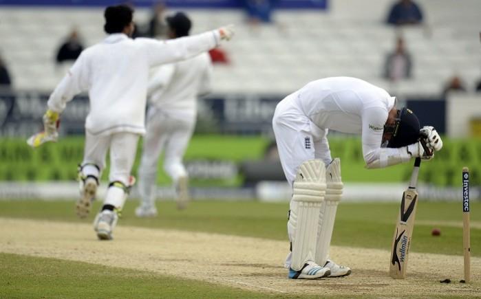 England's James Anderson looks dejected after Sri Lanka won the second Test. James Anderson Sad