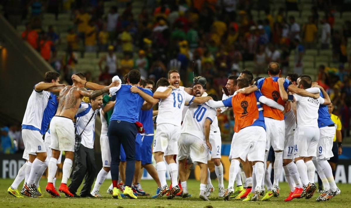 Greece's national soccer team players celebrate after their win over Ivory Coast during their 2014 World Cup Group C soccer match at the Castelao arena in Fortaleza Greece vs Ivory Coast