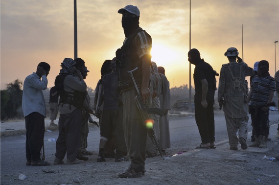 ISIS fighters at a checkpoint in the northern Iraq city of Mosul