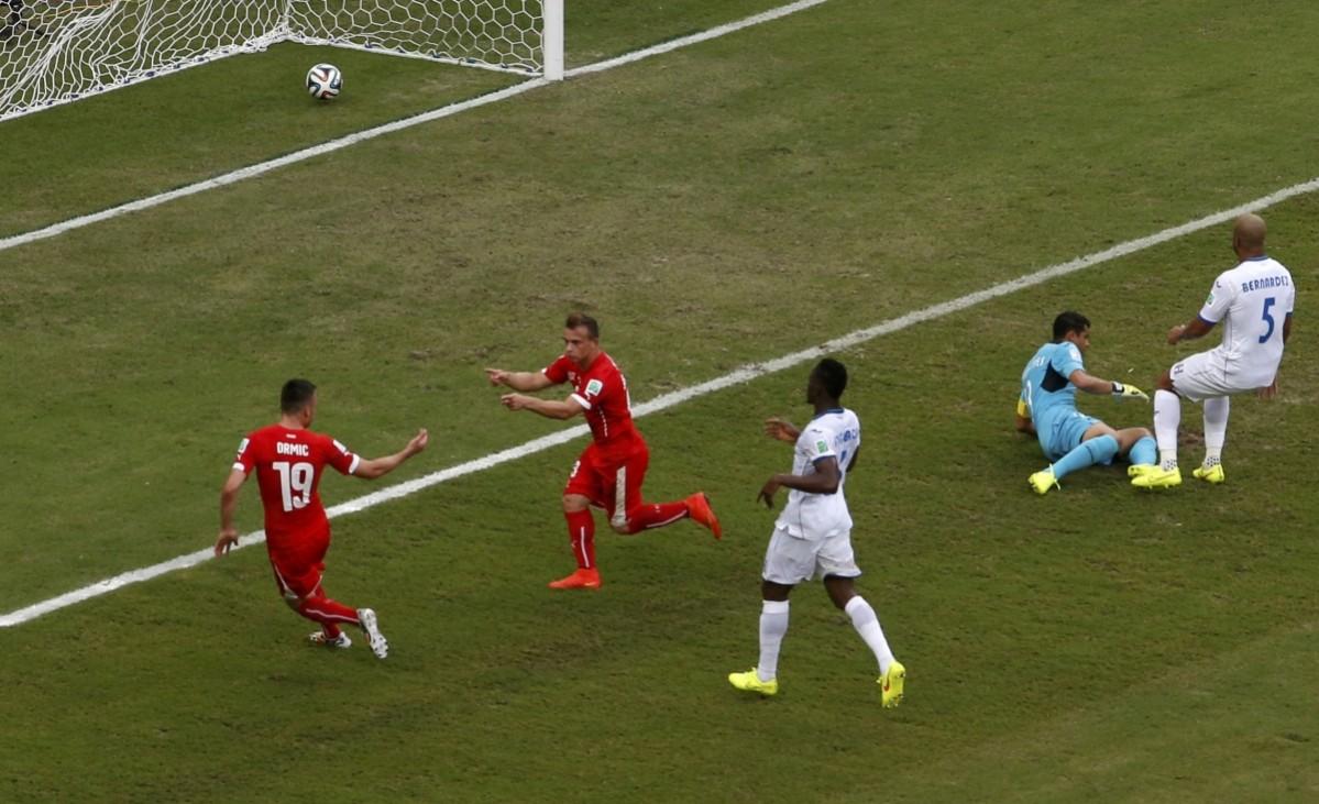 Switzerland's Xherdan Shaqiri scores his second goal during their 2014 World Cup Group E match against Honduras at the Amazonia arena in Manaus Honduras vs Switzerland