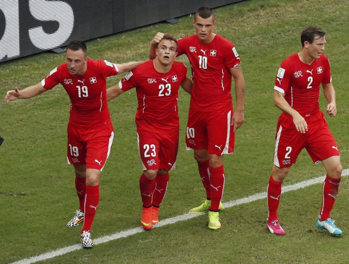 Switzerland's Shaqiri celebrates with teammates Drmic, Xhaka and Lichtsteiner after scoring his second goal during their 2014 World Cup Group E soccer match against Honduras at the Amazonia arena in Manaus Honduras vs Switzerland