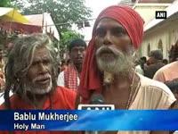 holy-men-in-assam-take-a-break-from-spiritual-odyssey-to-enjoy-fifa