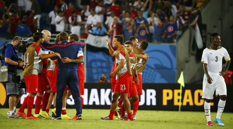 USA players celebrate their win against Ghana after their 2014 World Cup Group G match at the Dunas arena in Natal USA