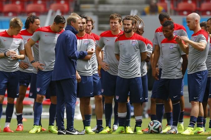 USA coach Jurgen Klinsmann talks to his players during a training session, 25 June Jurgen Klinsmann USA