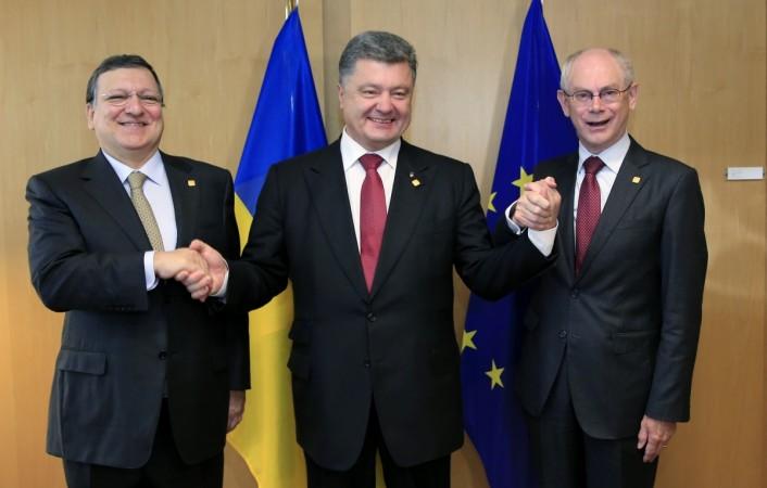 Ukraine's President Poroshenko poses with European Commission President Barroso and European Council President Van Rompuy at EU Council in Brussels Ukraine's President Poroshenko poses with European Commission President Barroso and European Council President Van Rompuy at EU Council in Brussels