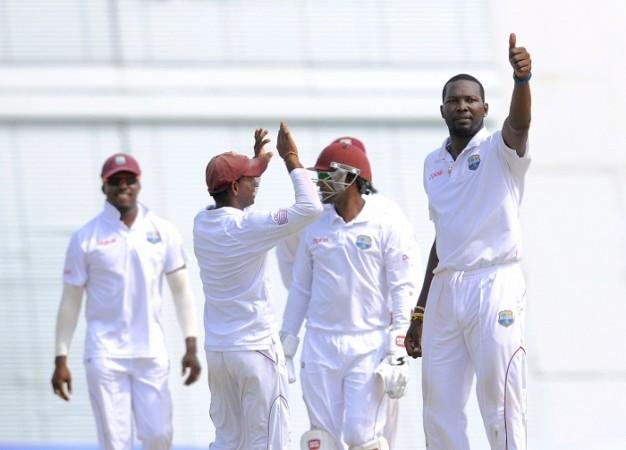 Sulieman Benn celebrates with teammates during 3rd Test. Sulieman Benn