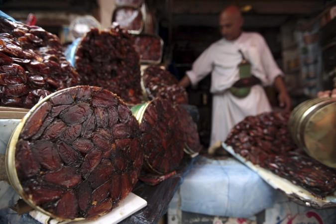 A vendor displays dates at a dates market in Sanaa ahead of Ramadan Ramadan 2017